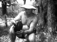 Karl Hallikainen with turtle, Pacific Island, 1930s